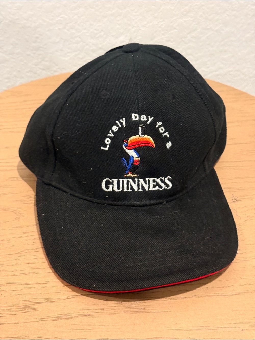 Guinness Black Cap with Colorful Toucan Embroidery